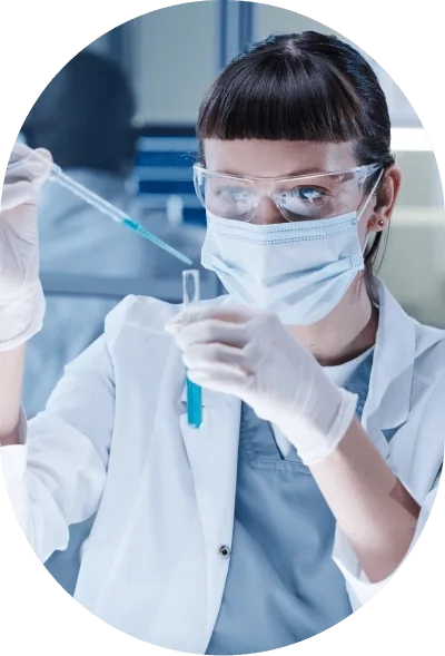 Scientist pipetting a sample into a tube in a sequencing lab